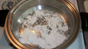 Add flour to dry, preheated skillet