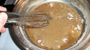 Remove from heat and whisk in broth or stock.