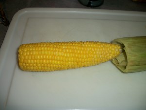 Perfectly cooked corn emerges clean of all silk and husks!