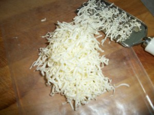 Grate cold butter for easier seasoning.