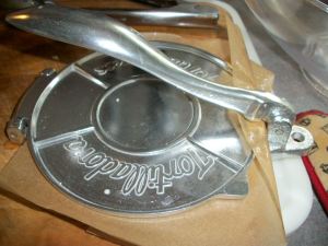 Gently press dough. If dough is too stiff, add a tiny bit more water.